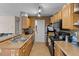 Practical kitchen layout featuring modern appliances and lots of counter space, creating an inviting cooking environment at 10265 Gandy N Blvd # 1203, St Petersburg, FL 33702