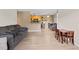 Bright and airy living space flowing into the kitchen, featuring updated flooring and ideal for both living and entertaining at 10265 Gandy N Blvd # 1203, St Petersburg, FL 33702