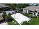 Aerial view of community volleyball court with picnic table and plenty of parking at 10265 Gandy N Blvd # 1203, St Petersburg, FL 33702