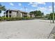 Enjoy a community volleyball court for outdoor recreation in front of the apartment building at 10265 Gandy N Blvd # 1203, St Petersburg, FL 33702