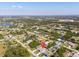 The aerial view shows a red marker over the home surrounded by trees and other houses at 109 Beau Rivage Dr, Rotonda West, FL 33947