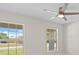 Bright bedroom boasts large windows that offer serene outdoor views at 109 Beau Rivage Dr, Rotonda West, FL 33947