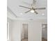 Bedroom featuring a closet, a ceiling fan and tile floors at 109 Beau Rivage Dr, Rotonda West, FL 33947