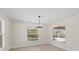 This bedroom is bright with large windows that offer serene outdoor views at 109 Beau Rivage Dr, Rotonda West, FL 33947