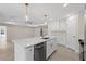 The kitchen features a large island with sink and stainless dishwasher at 109 Beau Rivage Dr, Rotonda West, FL 33947