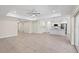 Spacious living room with tile floors, recessed lighting, and an open floor plan at 109 Beau Rivage Dr, Rotonda West, FL 33947