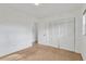 Neutral bedroom with wall to wall carpet and a closet with folding doors at 1710 Orange Hill Way, Brandon, FL 33510