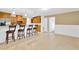 Kitchen features oak cabinets, granite countertops, stainless appliances and a breakfast bar with seating at 1710 Orange Hill Way, Brandon, FL 33510