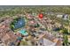 Condominiums overlook a shimmering community pool, fountain pond, and lush landscaping at 17978 Villa Creek Dr, Tampa, FL 33647