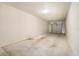 An empty one car garage with an open door at 17978 Villa Creek Dr, Tampa, FL 33647
