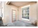 Covered patio area featuring a door and a window, perfect for outdoor relaxation at 17978 Villa Creek Dr, Tampa, FL 33647