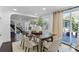 Bright dining area with hardwood floors, modern decor, and a sliding glass door at 222 11Th N Ave, St Petersburg, FL 33701