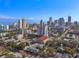 Enjoy city views from this aerial of downtown featuring high rise condos and a mural on the side of a building at 226 5Th N Ave # 901, St Petersburg, FL 33701