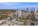 Enjoy city views from this aerial featuring high rise condos, water views, and a mural on the side of a building at 226 5Th N Ave # 901, St Petersburg, FL 33701