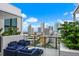 City skyline views from this condo balcony with plenty of comfortable seating to relax at 226 5Th N Ave # 901, St Petersburg, FL 33701