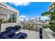 Relax in style on this condo balcony with lounge seating and skyline views at 226 5Th N Ave # 901, St Petersburg, FL 33701