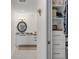 Bathroom featuring a single sink vanity, granite countertop, and closet with built-in shelving at 226 5Th N Ave # 901, St Petersburg, FL 33701