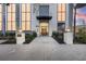 Inviting building entrance featuring a grand doorway and manicured landscaping with street access at 226 5Th N Ave # 901, St Petersburg, FL 33701