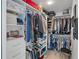 Walk-in closet with organized shelving, hanging rods, and drawers, maximizing storage space at 226 5Th N Ave # 901, St Petersburg, FL 33701