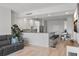 Bright living room with a modern open floor plan, breakfast bar, and stainless steel appliances at 226 5Th N Ave # 901, St Petersburg, FL 33701