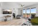 Relaxing living room with a ceiling fan and sliding glass doors to the balcony at 226 5Th N Ave # 901, St Petersburg, FL 33701