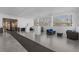 Bright lobby with comfortable seating areas, large windows, and sleek tile flooring and refined details at 226 5Th N Ave # 901, St Petersburg, FL 33701