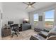Home office with a desk, large windows, and a comfortable leather sofa at 226 5Th N Ave # 901, St Petersburg, FL 33701