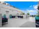 Spacious rooftop patio features modern seating and lush landscaping for urban relaxation at 226 5Th N Ave # 901, St Petersburg, FL 33701