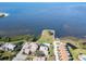 Waterfront condo community with a pool and pier overlooking the blue waters of the Gulf of Mexico at 25 Windrush Bay Dr # 25, Tarpon Springs, FL 34689