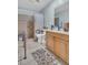Spacious bathroom with updated vanity, walk-in shower, and accessibility features at 25 Windrush Bay Dr # 25, Tarpon Springs, FL 34689