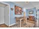 Cozy dining area featuring a table for four and natural light at 25 Windrush Bay Dr # 25, Tarpon Springs, FL 34689