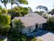 Well-maintained one-story home with lush tropical landscaping and a peaceful setting at 25 Windrush Bay Dr # 25, Tarpon Springs, FL 34689