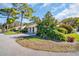 Well-maintained lawn with vibrant landscaping adds to this home's inviting curb appeal at 25 Windrush Bay Dr # 25, Tarpon Springs, FL 34689