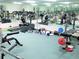 Community gym featuring treadmills, exercise bikes, weight bench and free weights at 25 Windrush Bay Dr # 25, Tarpon Springs, FL 34689