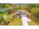 Aerial view of the estate featuring a long driveway and large backyard at 27930 Ravens Brook Rd, Wesley Chapel, FL 33544