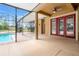 Inviting pool with screened enclosure, patio space, and direct access to the pool area at 27930 Ravens Brook Rd, Wesley Chapel, FL 33544