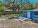 Backyard features a privacy fence and shaded grass, great for entertaining and relaxing at 2926 W Elrod Ave, Tampa, FL 33611