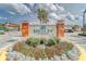 Medley at Mirada community entrance with stone signage, landscaping, and palm trees at 31999 Surfton Knot Ct, San Antonio, FL 33576