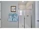 Bathroom shower featuring glass door and white tiled walls at 31999 Surfton Knot Ct, San Antonio, FL 33576