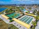 Aerial view of the community shuffleboard and bocce ball courts, perfect for active living at 31999 Surfton Knot Ct, San Antonio, FL 33576