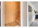 Unfinished stairway with wood steps and plywood walls, leading to potential extra space at 31999 Surfton Knot Ct, San Antonio, FL 33576