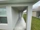 This outdoor entryway has a concrete floor at 35478 Bellington Blvd, Zephyrhills, FL 33541