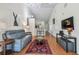 Spacious living room with high ceilings and an open layout with views to the dining area at 3638 Trafalgar Way # 103, Palm Harbor, FL 34685