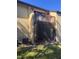 A photo displaying the outdoor patio featuring a screened-in lower level and an upper level deck at 4215 E Bay Dr # 1701B, Clearwater, FL 33764