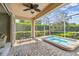 Outdoor patio features an above-ground spa and furniture for seating at 4410 Sawgrass Dr, Palm Harbor, FL 34685