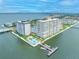 Luxury condo buildings on the water with a community pool and boat docks at 5220 Brittany S Dr # 1409, St Petersburg, FL 33715