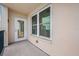 Balcony with views of the property and a doorway to the condo's interior at 5220 Brittany S Dr # 1409, St Petersburg, FL 33715