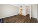 Spacious bedroom with wood floors, closets, and white doors at 5220 Brittany S Dr # 1409, St Petersburg, FL 33715