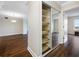 Bright room with mirrored closet doors, shelving and hardwood floors at 5220 Brittany S Dr # 1409, St Petersburg, FL 33715