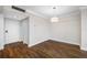 Entryway with hardwood floors, large closet and decorative lighting at 5220 Brittany S Dr # 1409, St Petersburg, FL 33715